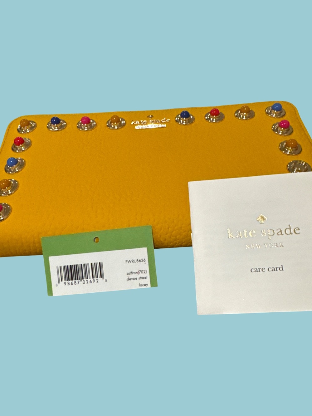 kate spade yellow leather zip wallet with multicolor studs